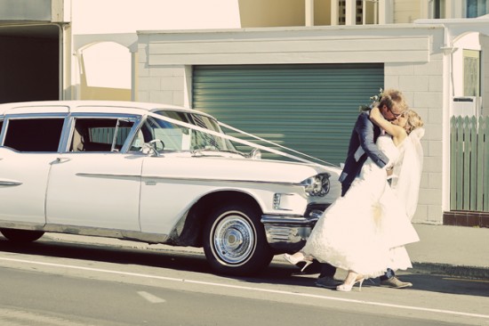 Kissing by the 1958 Caddy