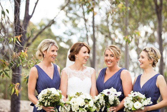 blue with bridesmaids in deep blue