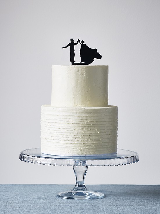 white cake with black silhouette