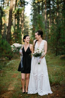 Bride and bridesmaid in forest wedding