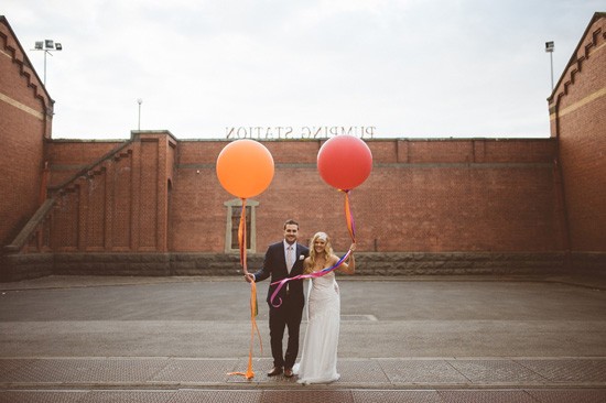 Bride and groom with baloons