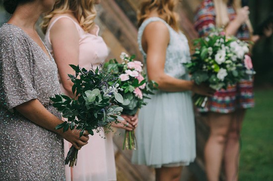 Bridesmaids in mismtached gowns