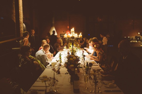 Candle lit industrial wedding reception