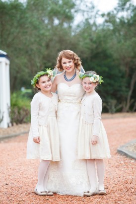 Porrait of bride with flowergirls