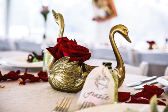 brass swan wedding decor