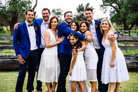 bridal party in blue and white