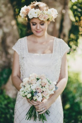 bride with cream rose flower crown