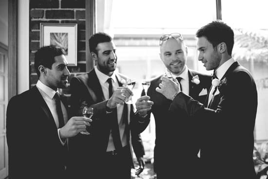 groom and groomsmen toast