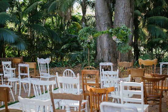 mismatched chairs at wedding ceremony