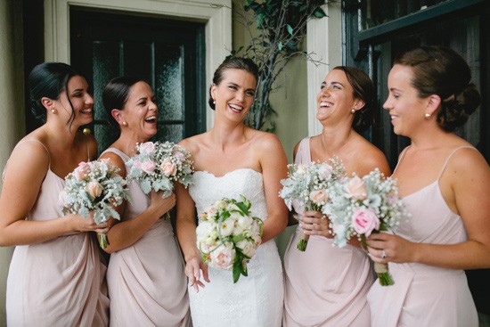 Bride with bridesmaids in nude pink