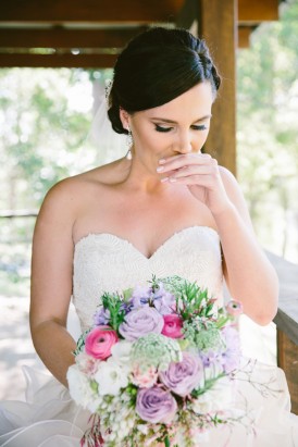 Bride with purple and pink bouquet
