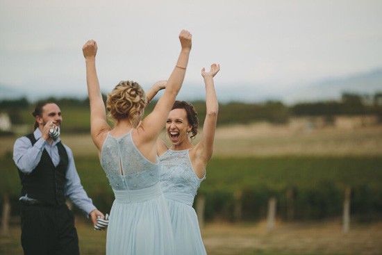 Bridesmaids in duck egg blue dresses
