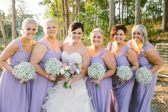 Bridesmaids in lilac gowns