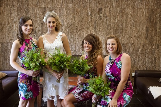 Bridesmaids in magenta dresses