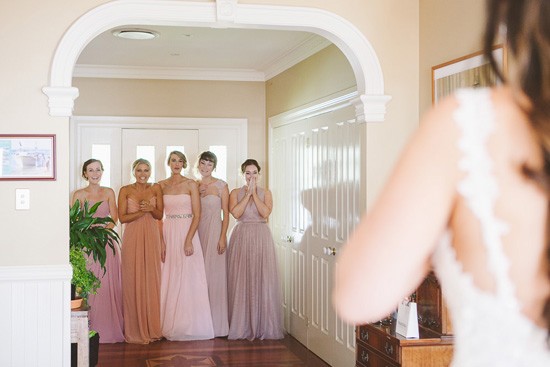 Bridesmaids in mismatched pink dresses