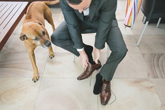 Groom getting ready with his dog