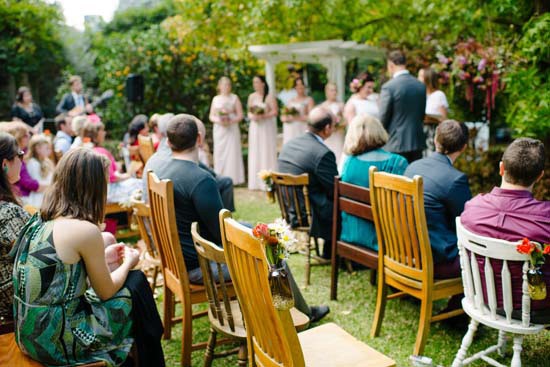 Mismmatched chairs at wedding ceremony