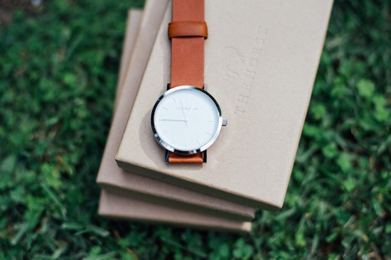 Silver watch with tan band