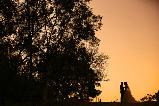 Sunset wedding photo by Alan Hughes