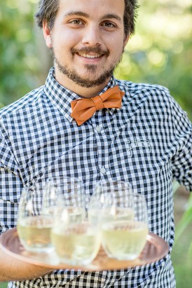 Waiter with Gingham Shirt and Champagne
