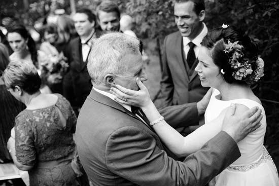 Winery hugs and kisses post wedding