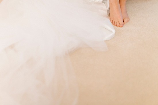 Barefoot bride with dress