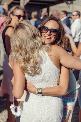 Bride being hugged