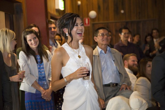 Bride laughing at speeches