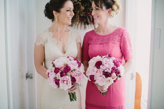 Bride with bridesmaid in rose pink