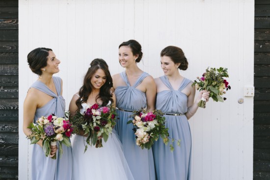 Bride with bridesmaids in blue