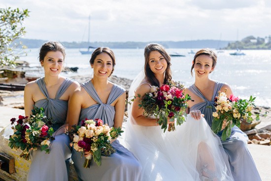 Bride with bridesmaids in pale blue