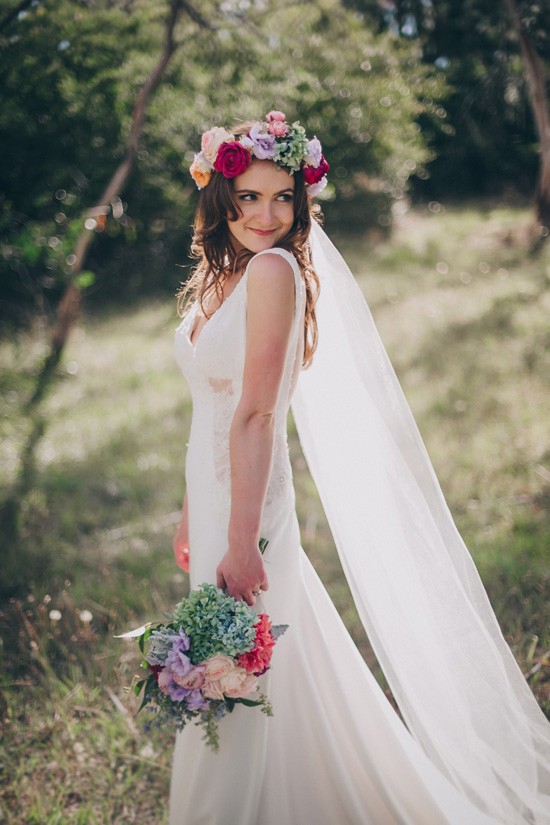 Bride with colourful bouquet and flower crown