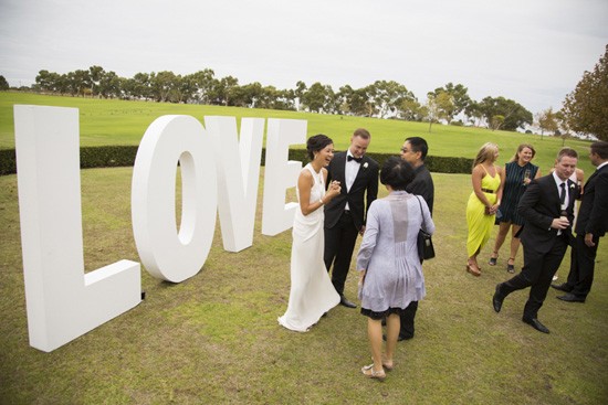 Giant lvoe letters at wedding reception