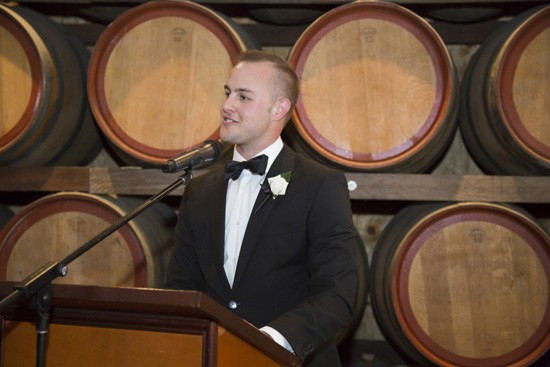 Giving speeches at winery wedding