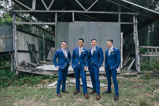 Groom and groomsmen in blue suits