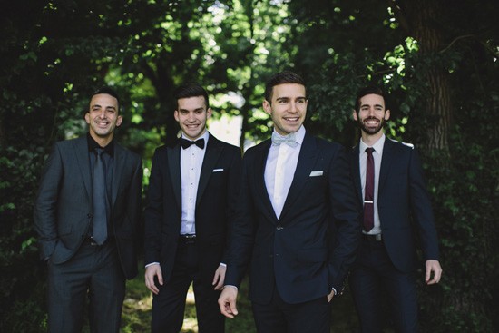 Groom with groomsmen in mismatched attire