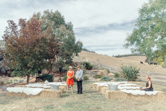 Haybale seating at country wedding