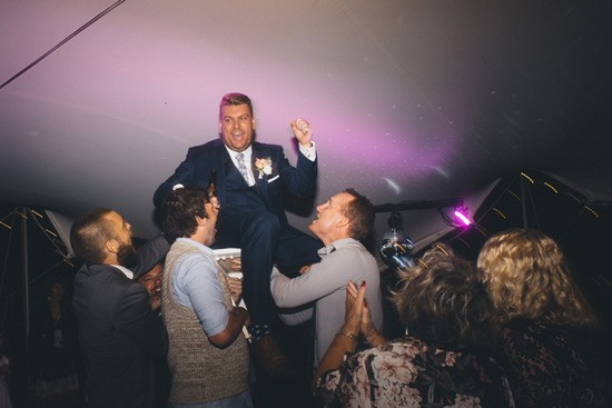 Lifting groom during dancing