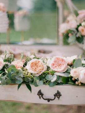 Pink and peach roses with greenery