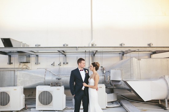 Wedding photo with industrial backdrop