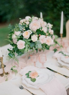 Wedding table setting with pink and peach