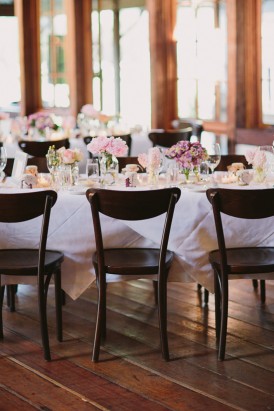 Wedding venue with dark wood chairs