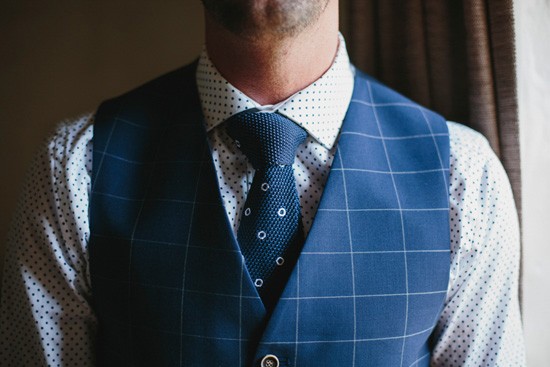 Blue patterned waistcoat on groom