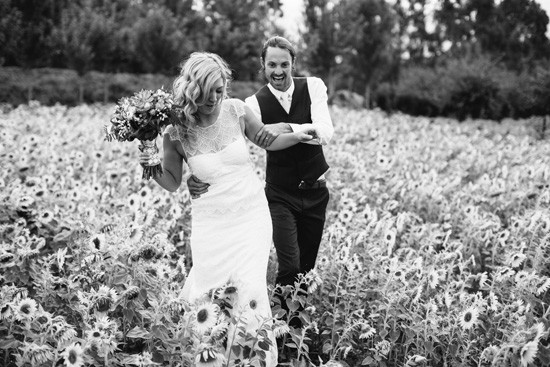 Bride and groom with sun flowers