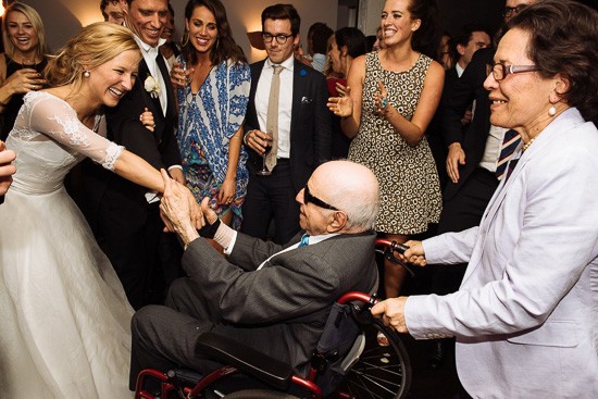 Bride dancing with wheelchair guest