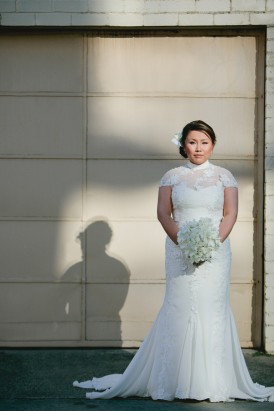Bride in high neck wedding gown