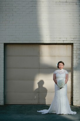 Bride in illusion neck wedding gown