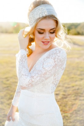 Bride in long sleeve wedding gown