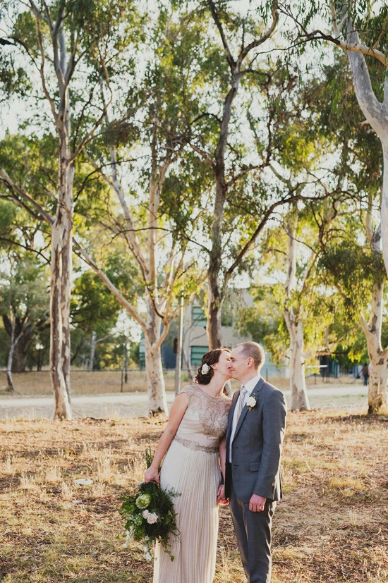 Bride kissing groom in Canberra