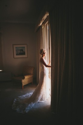 Bride wearing lace wedding gown